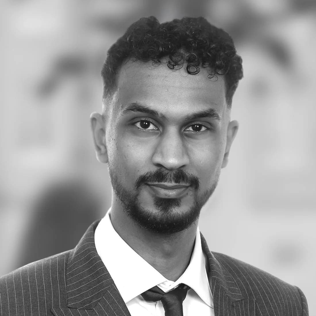 Porträtt av Hussein Haji